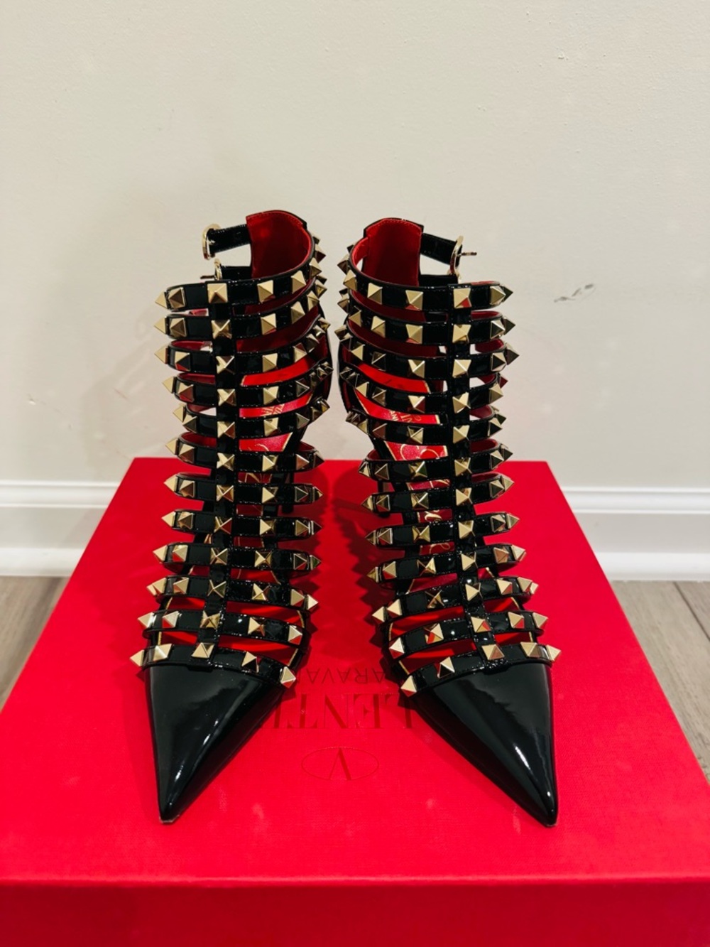 Valentino Garavani Black Patent Pointed Cage Heels with Gold Studs